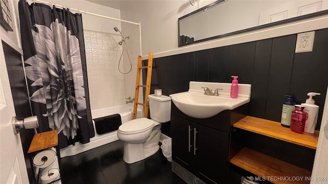 full bathroom with vanity, toilet, and shower / bath combo with shower curtain