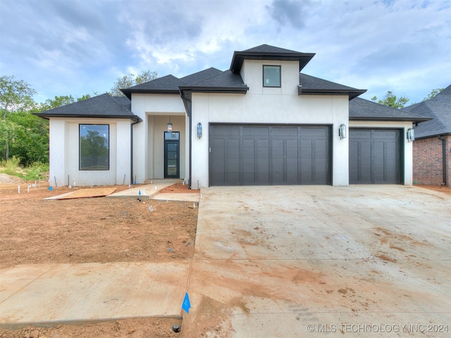 view of front of home with a garage