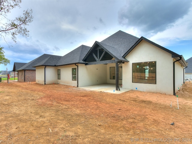 back of house featuring a patio area