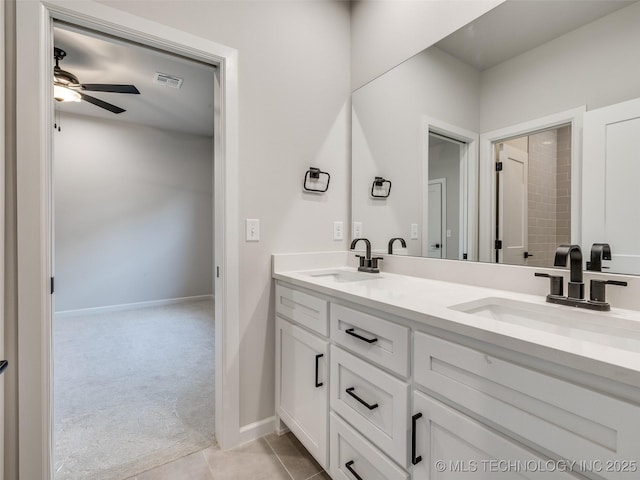 bathroom featuring vanity, tile patterned floors, and ceiling fan