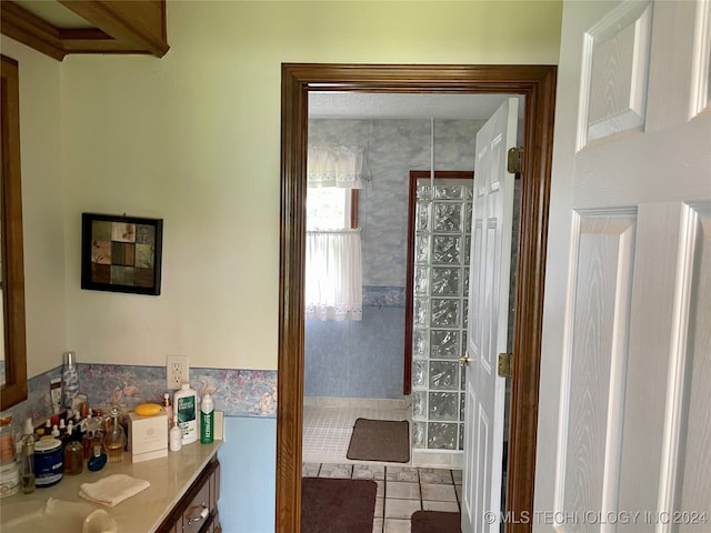 bathroom with vanity and tile patterned floors