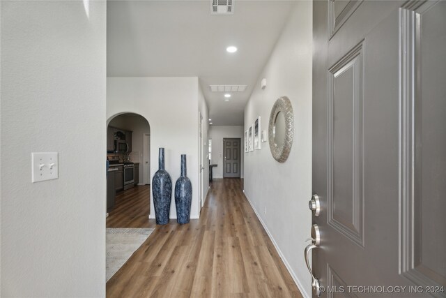 hallway featuring light hardwood / wood-style floors