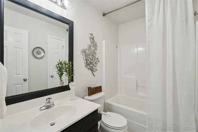 full bathroom with vanity, toilet, and shower / bath combo