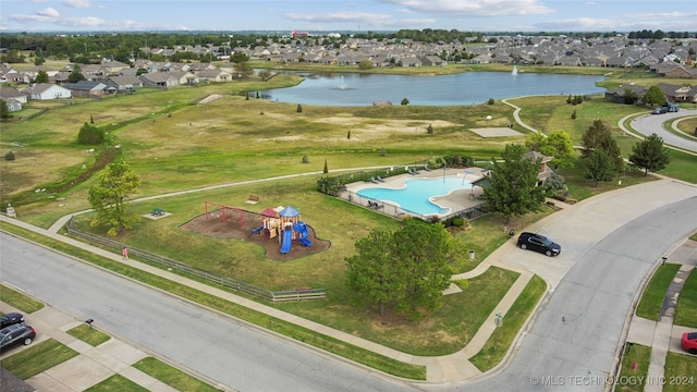 bird's eye view with a water view