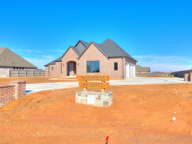 view of front of home with a garage