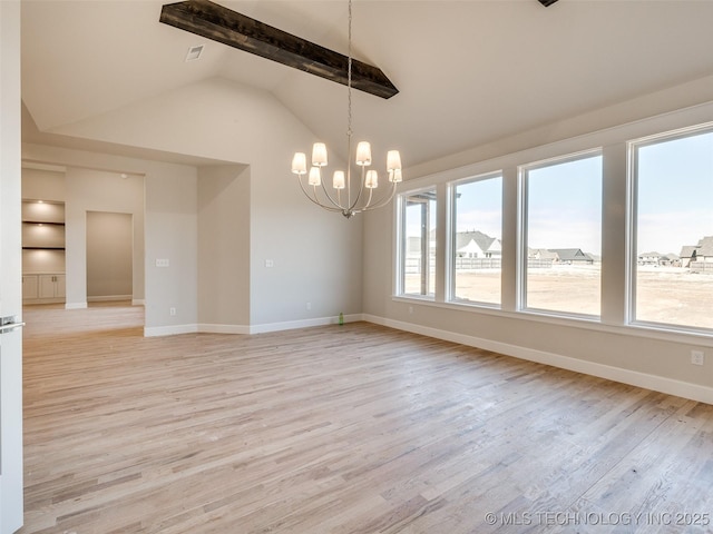 interior space with high vaulted ceiling, beam ceiling, light hardwood / wood-style floors, and a chandelier