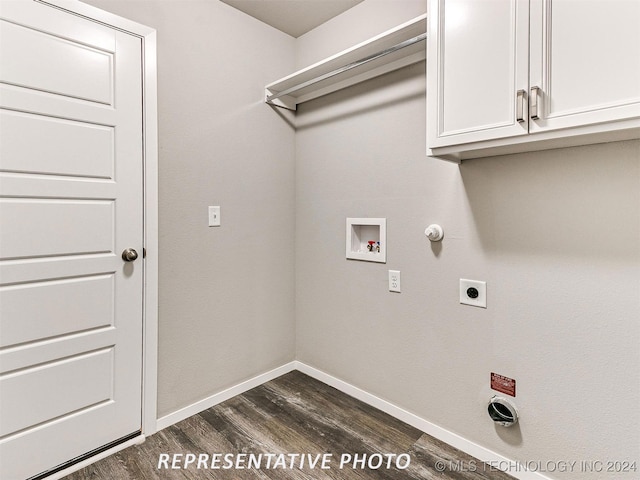 laundry area featuring cabinets, electric dryer hookup, washer hookup, dark hardwood / wood-style floors, and hookup for a gas dryer