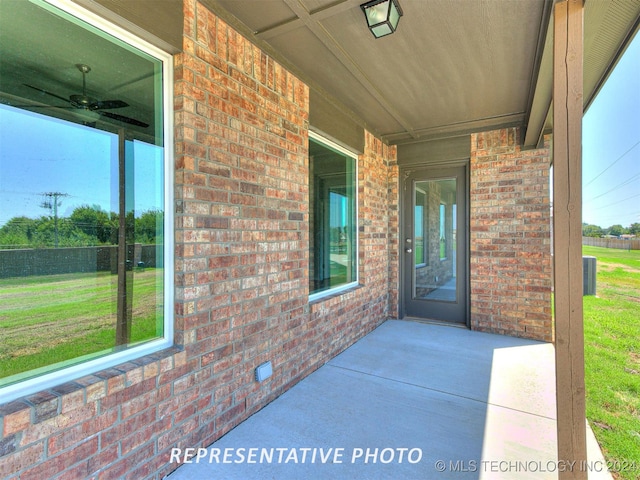 view of patio / terrace featuring ceiling fan