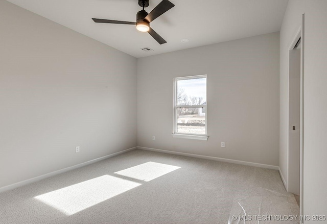 unfurnished bedroom featuring light colored carpet and ceiling fan