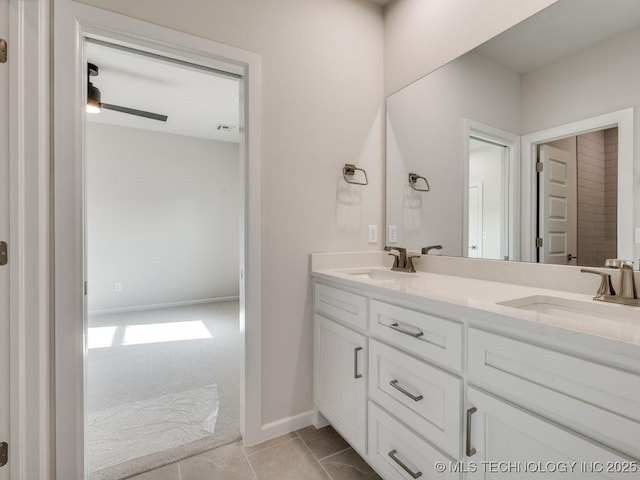 bathroom with vanity and tile patterned floors