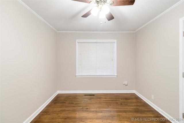 unfurnished room featuring ornamental molding, dark hardwood / wood-style floors, and ceiling fan