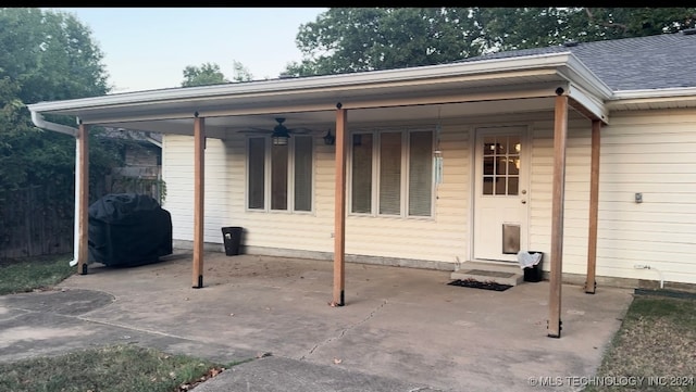 view of patio / terrace featuring area for grilling and ceiling fan