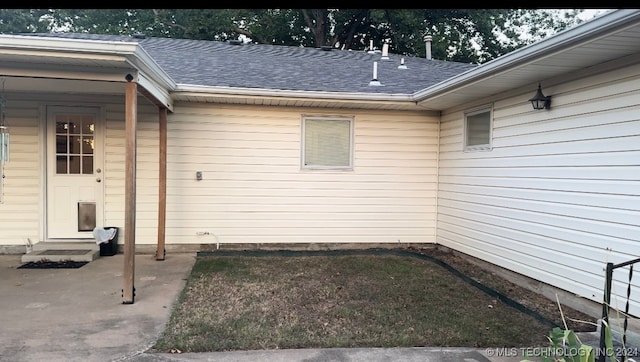 doorway to property featuring a patio area