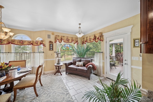 living area with ornamental molding and light tile patterned floors