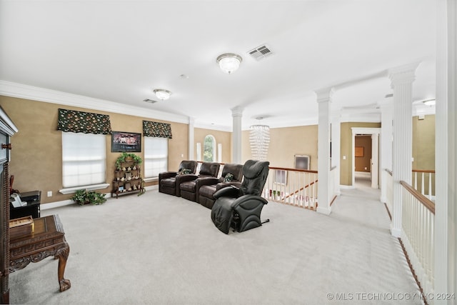 living room featuring crown molding, light colored carpet, and decorative columns