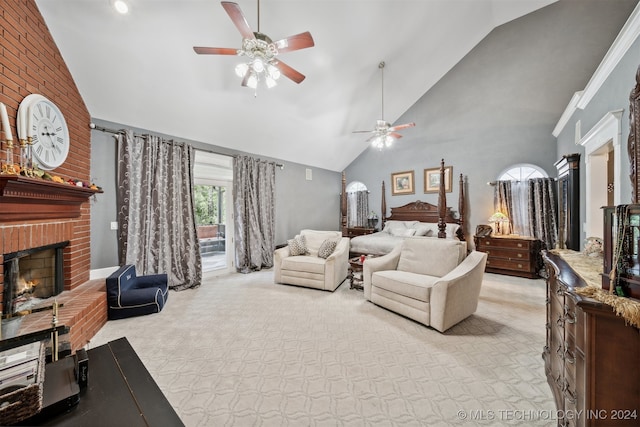 carpeted bedroom featuring ceiling fan, high vaulted ceiling, and a brick fireplace