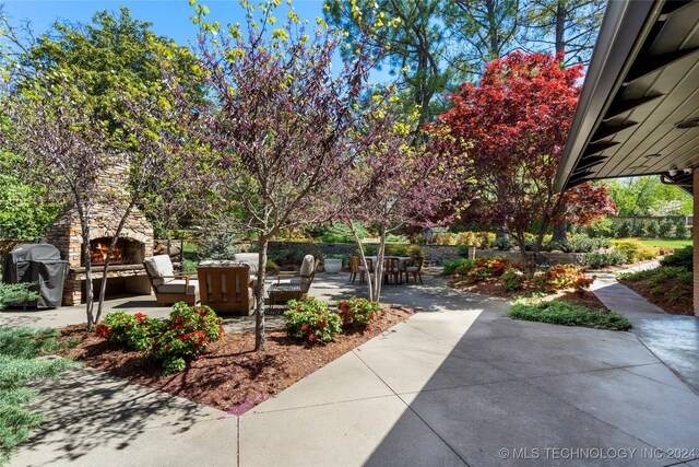 surrounding community featuring a patio area