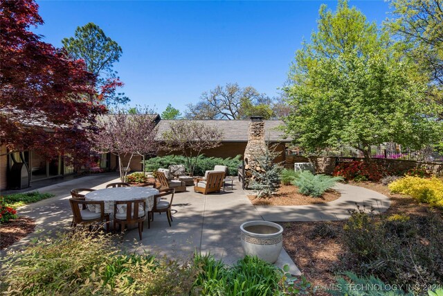 view of patio / terrace featuring an outdoor living space