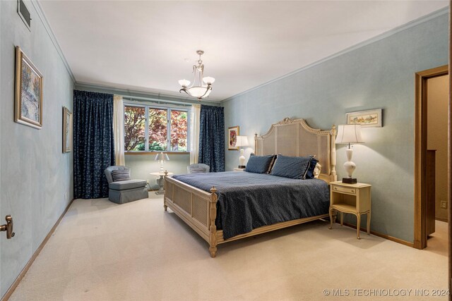 bedroom featuring an inviting chandelier, ornamental molding, and light colored carpet