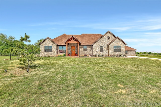 view of front facade with a front yard