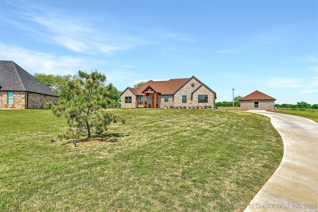 view of front of home with a front yard