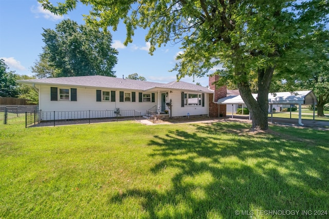 single story home with a front yard