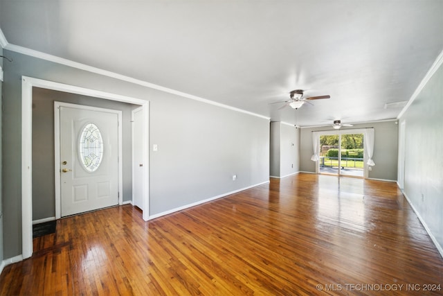 foyer with ceiling fan, ornamental molding, and hardwood / wood-style flooring