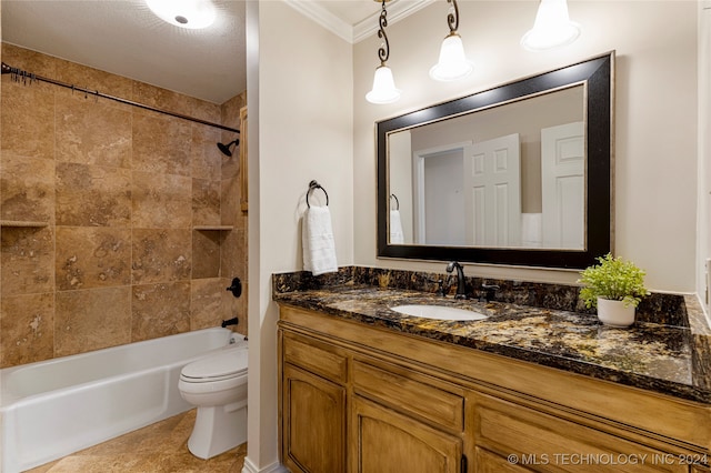 full bathroom featuring toilet, tiled shower / bath combo, vanity, ornamental molding, and a textured ceiling