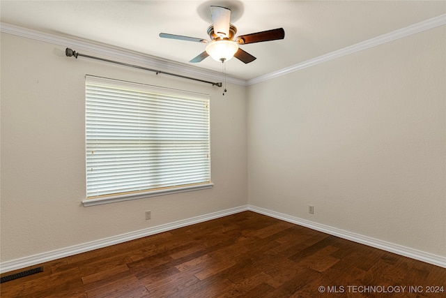 spare room featuring ceiling fan, dark hardwood / wood-style flooring, and ornamental molding