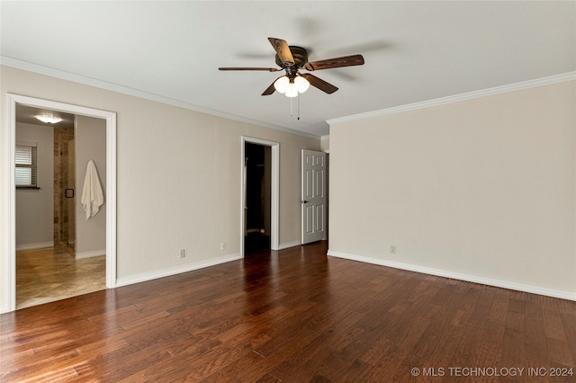 unfurnished room featuring ornamental molding, dark wood-type flooring, and ceiling fan