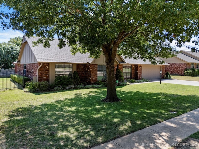 ranch-style house with a front yard