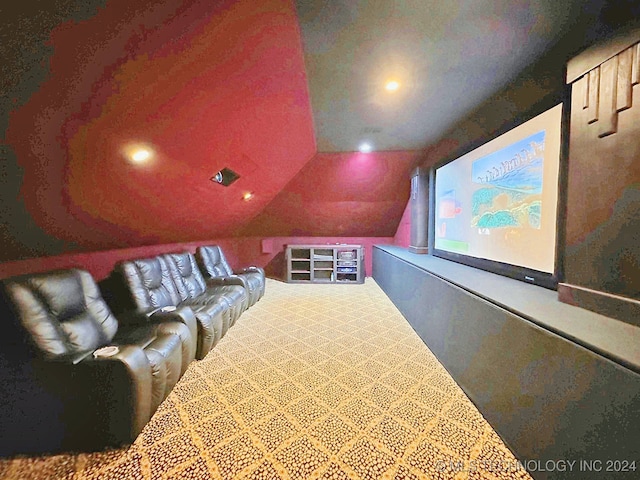 home theater featuring lofted ceiling