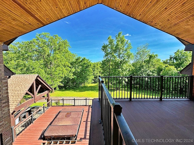 deck featuring a lawn