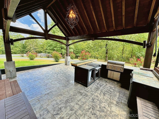 view of patio / terrace with a gazebo and area for grilling