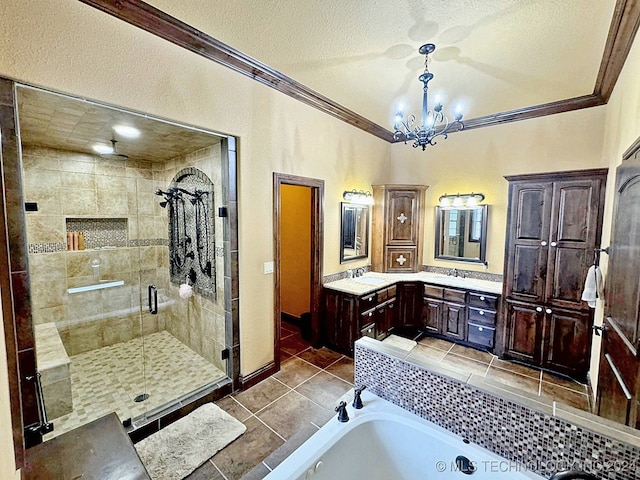 bathroom featuring a textured ceiling, vanity, an inviting chandelier, tile patterned flooring, and plus walk in shower