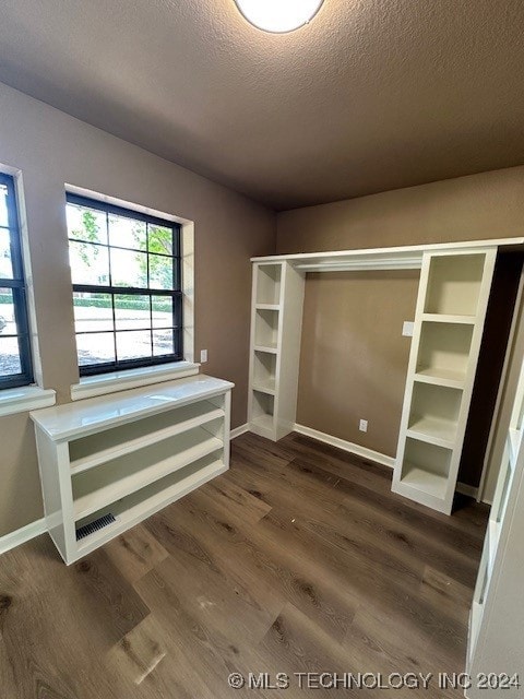 interior space featuring dark hardwood / wood-style floors