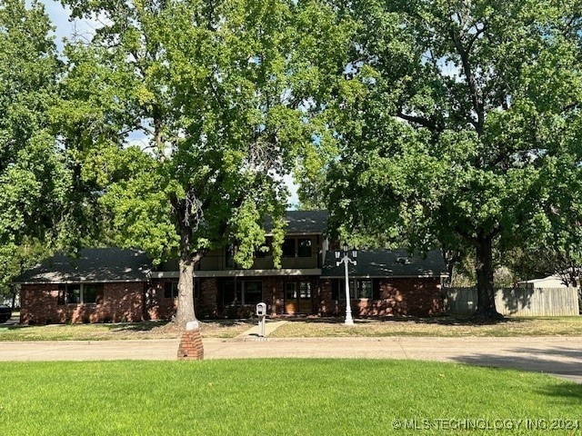 surrounding community featuring a lawn