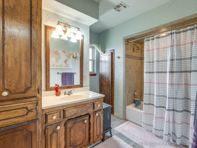 bathroom featuring vanity and shower / tub combo