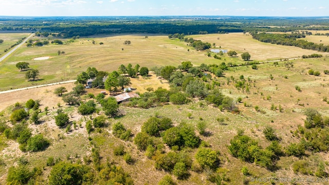 birds eye view of property featuring a rural view