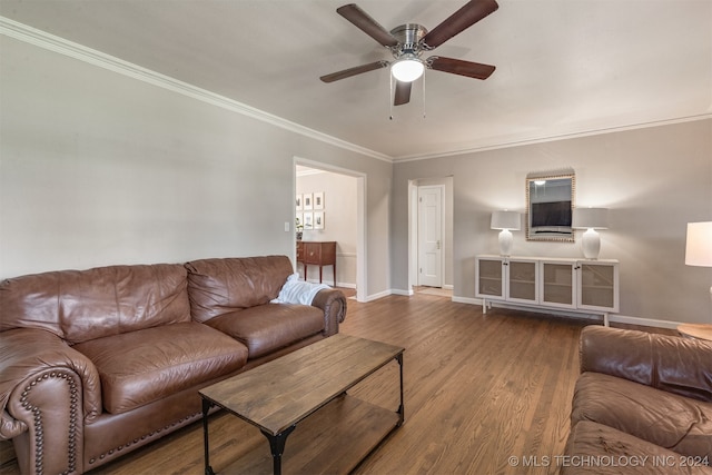 living room featuring ceiling fan, hardwood / wood-style flooring, and crown molding