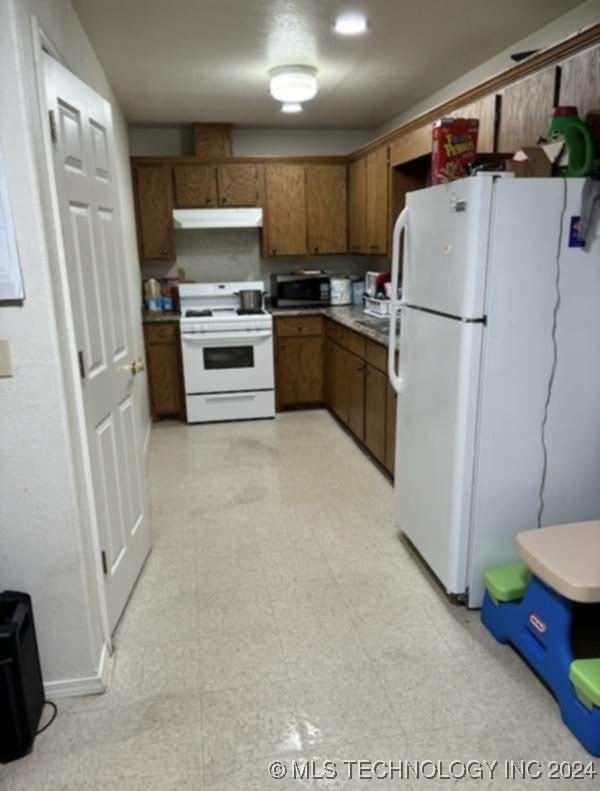 kitchen with white appliances