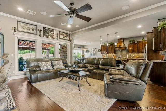 3526 Evans Ave, Mannford, OK 74044 - living area with dark wood-style flooring, crown molding, ceiling fan, healthy amount of natural light, and recessed lighting