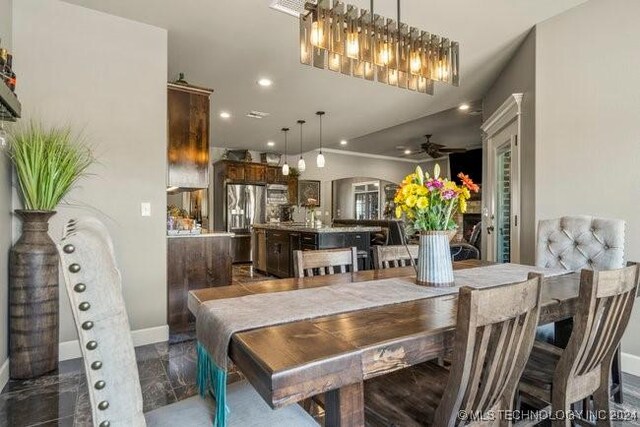 3526 Evans Ave, Mannford, OK 74044 - dining space with baseboards, recessed lighting, a ceiling fan, and arched walkways
