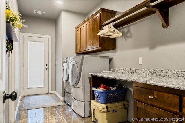 3526 Evans Ave, Mannford, OK 74044 - clothes washing area with washer and clothes dryer, cabinet space, marble finish floors, and baseboards