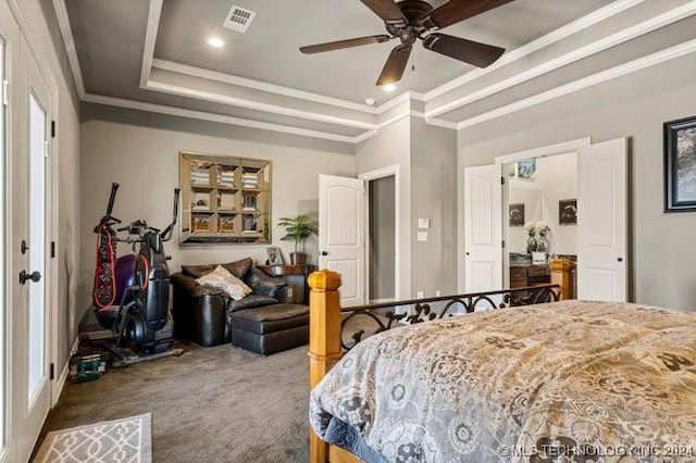 3526 Evans Ave, Mannford, OK 74044 - carpeted bedroom with ornamental molding, a tray ceiling, and a ceiling fan