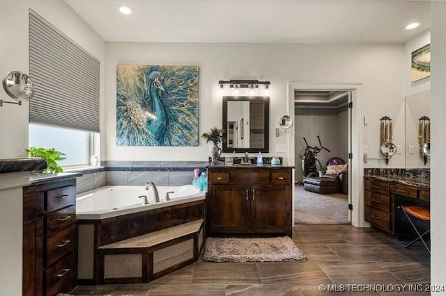 3526 Evans Ave, Mannford, OK 74044 - bathroom with vanity, a garden tub, and recessed lighting