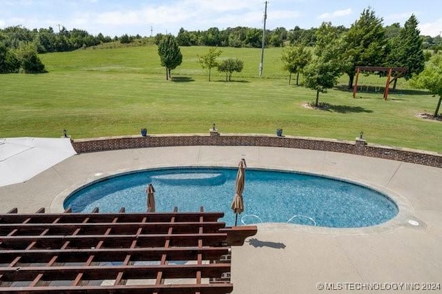 3526 Evans Ave, Mannford, OK 74044 - outdoor pool with a lawn and a patio area