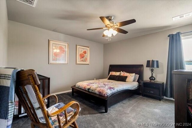3526 Evans Ave, Mannford, OK 74044 - bedroom featuring carpet, ceiling fan, and baseboards