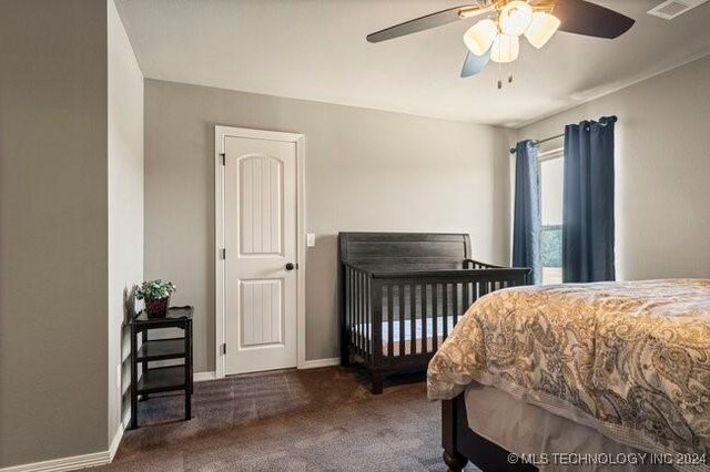 3526 Evans Ave, Mannford, OK 74044 - bedroom featuring carpet floors, baseboards, and a ceiling fan