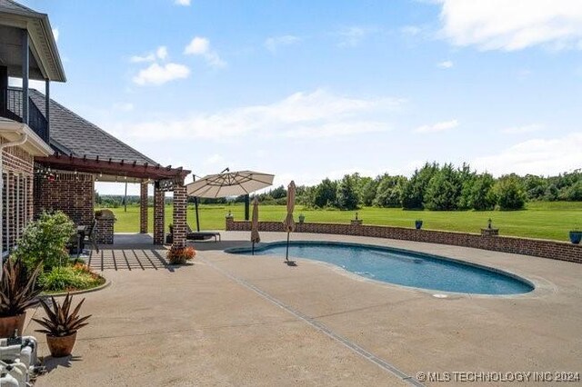 3526 Evans Ave, Mannford, OK 74044 - swimming pool featuring a patio area and a lawn